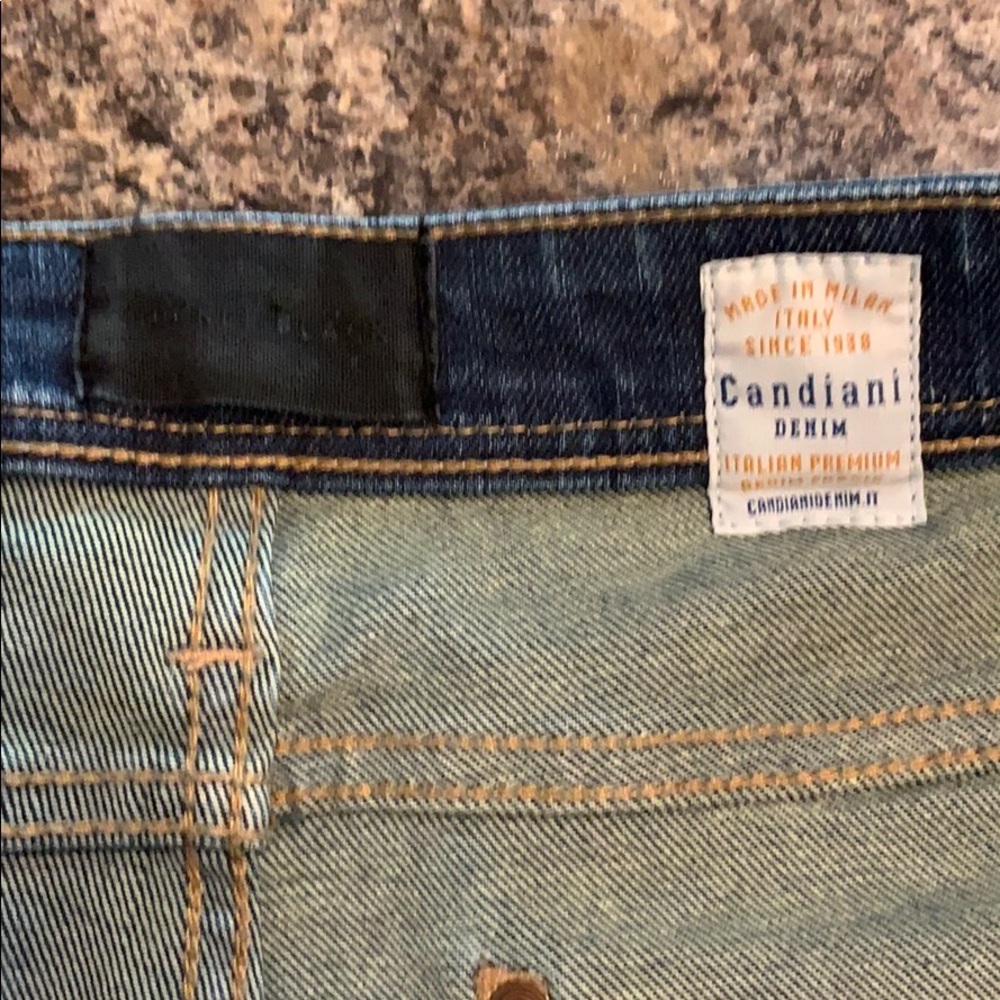 Buckle black denim jeans. Straight cut